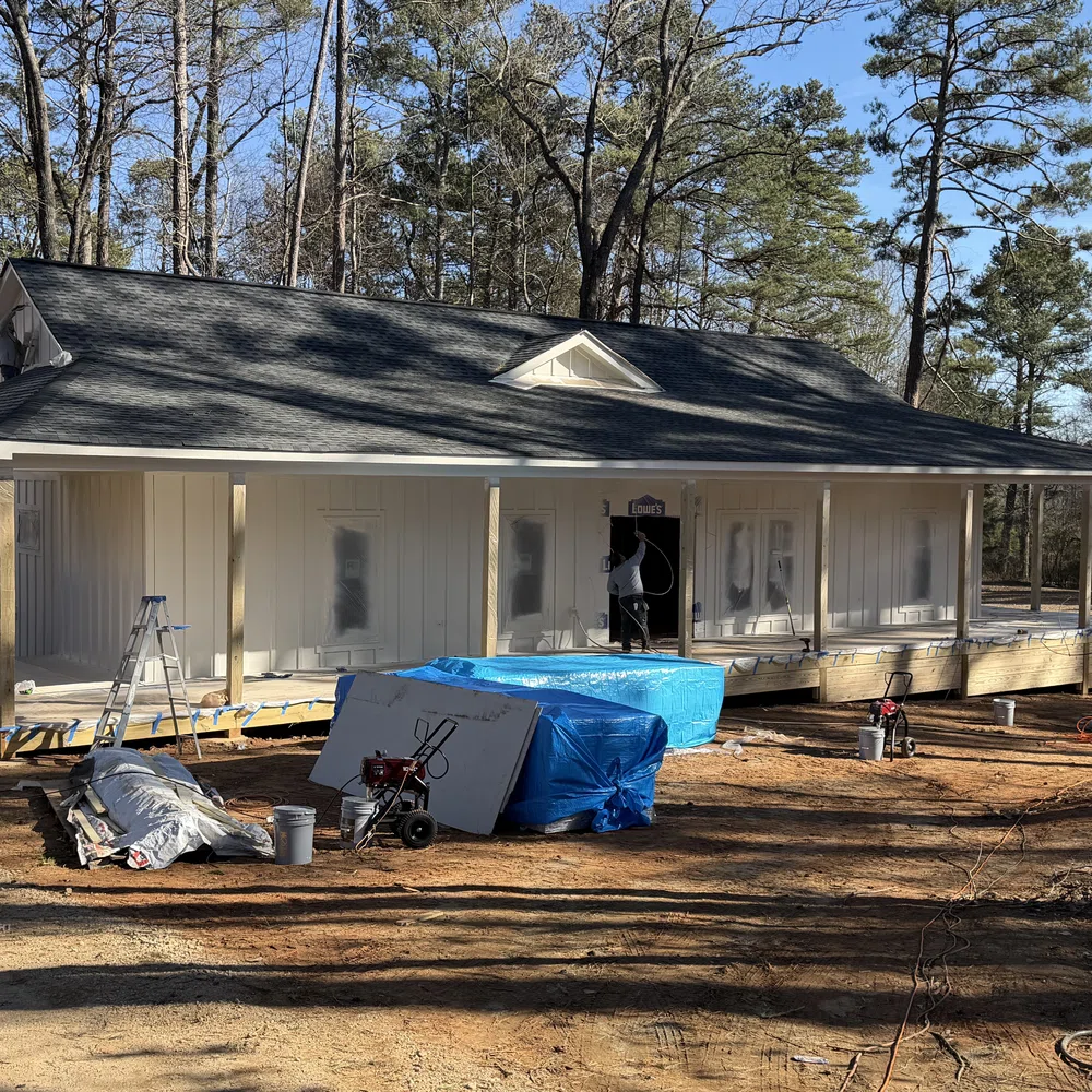 Emergency Repairs in Georgia underway as a contractor secures storm-damaged interior framing